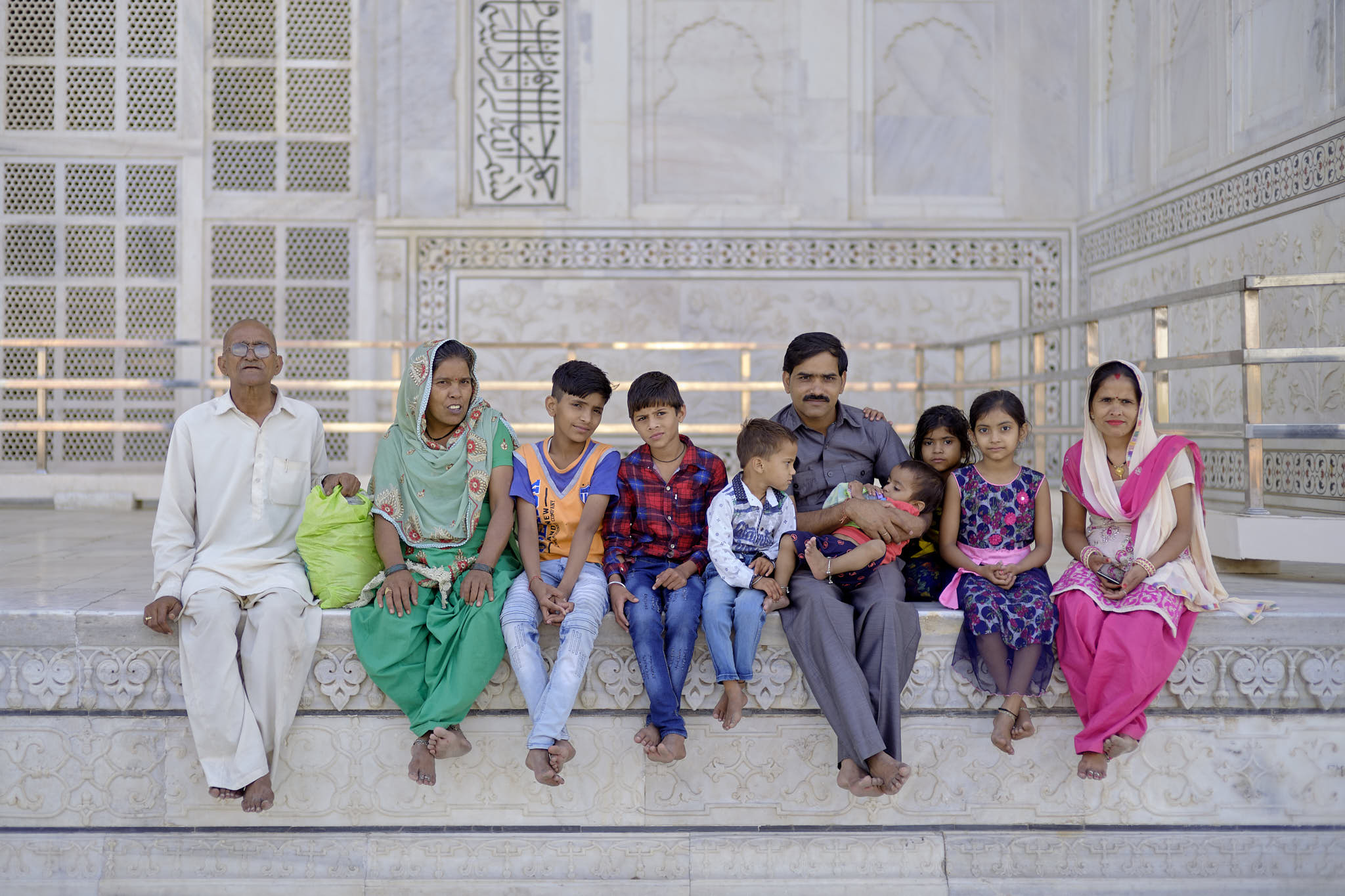 Family posing at Taj Mahal Agra, India; LEICA M10 50mm ISO-100 1/360sec
