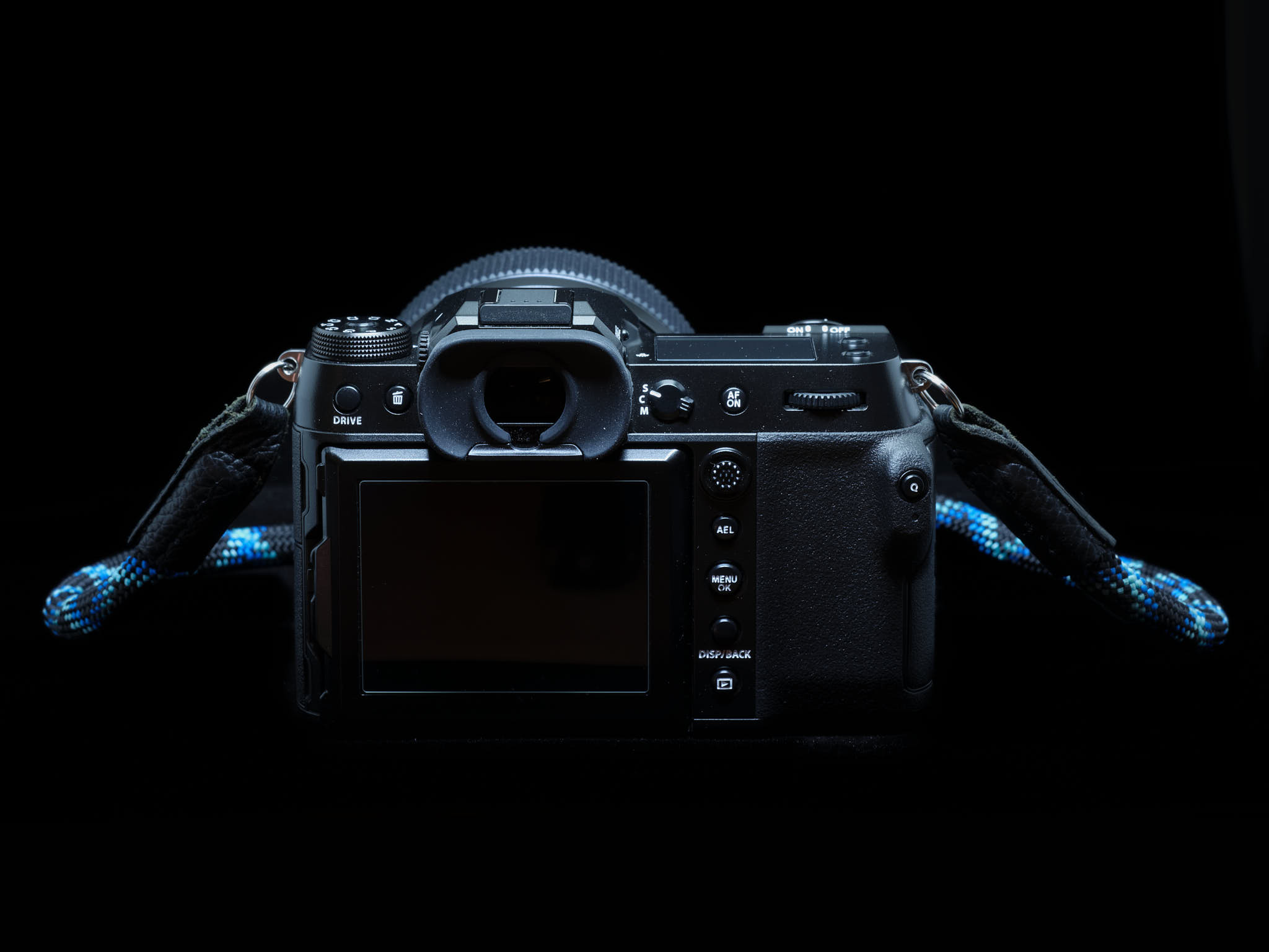 Back of Fujifilm GFX100S with GF80MM F1.7 lens attached