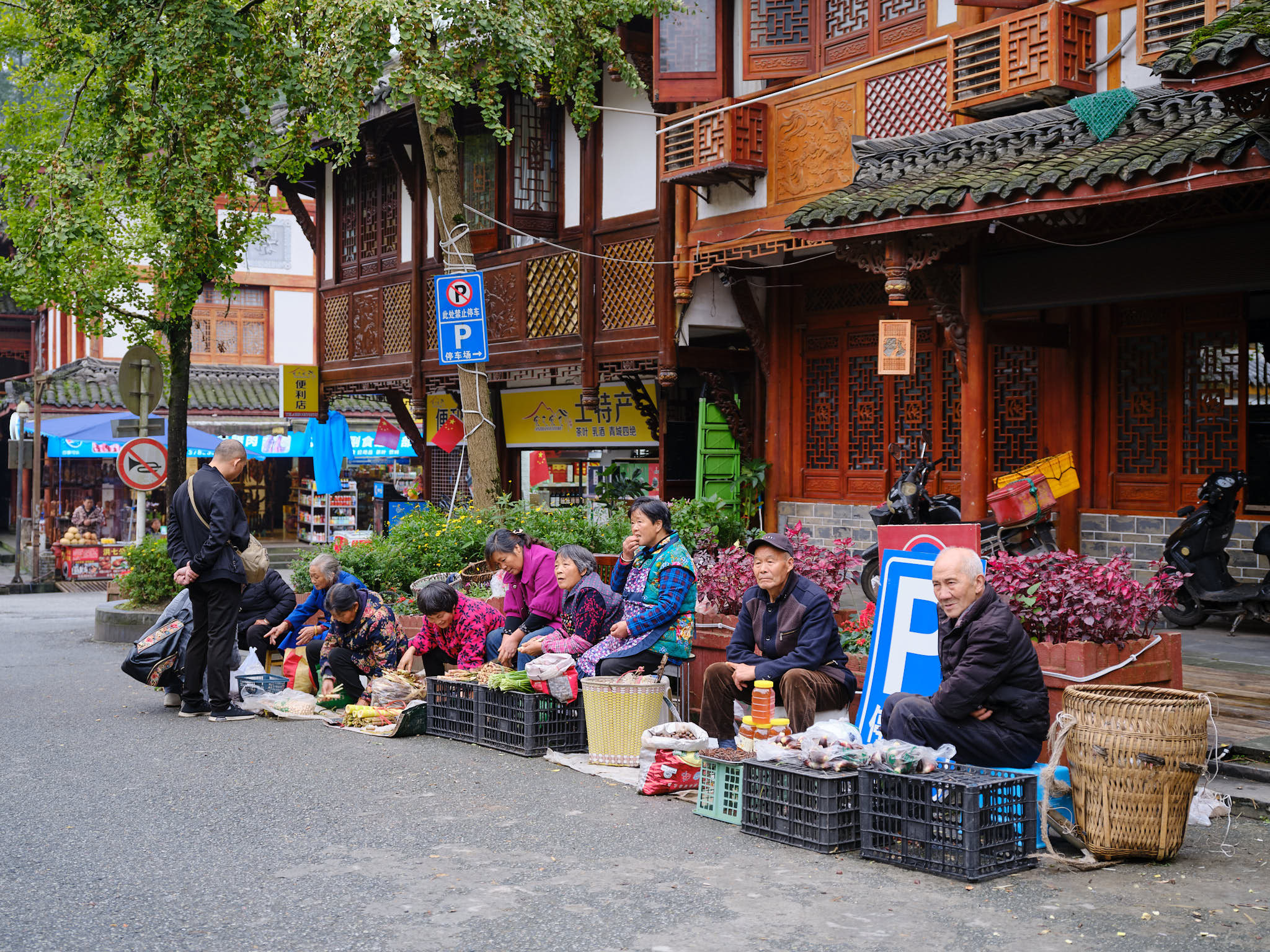 Villagers selling their wares at Qingcheng Village