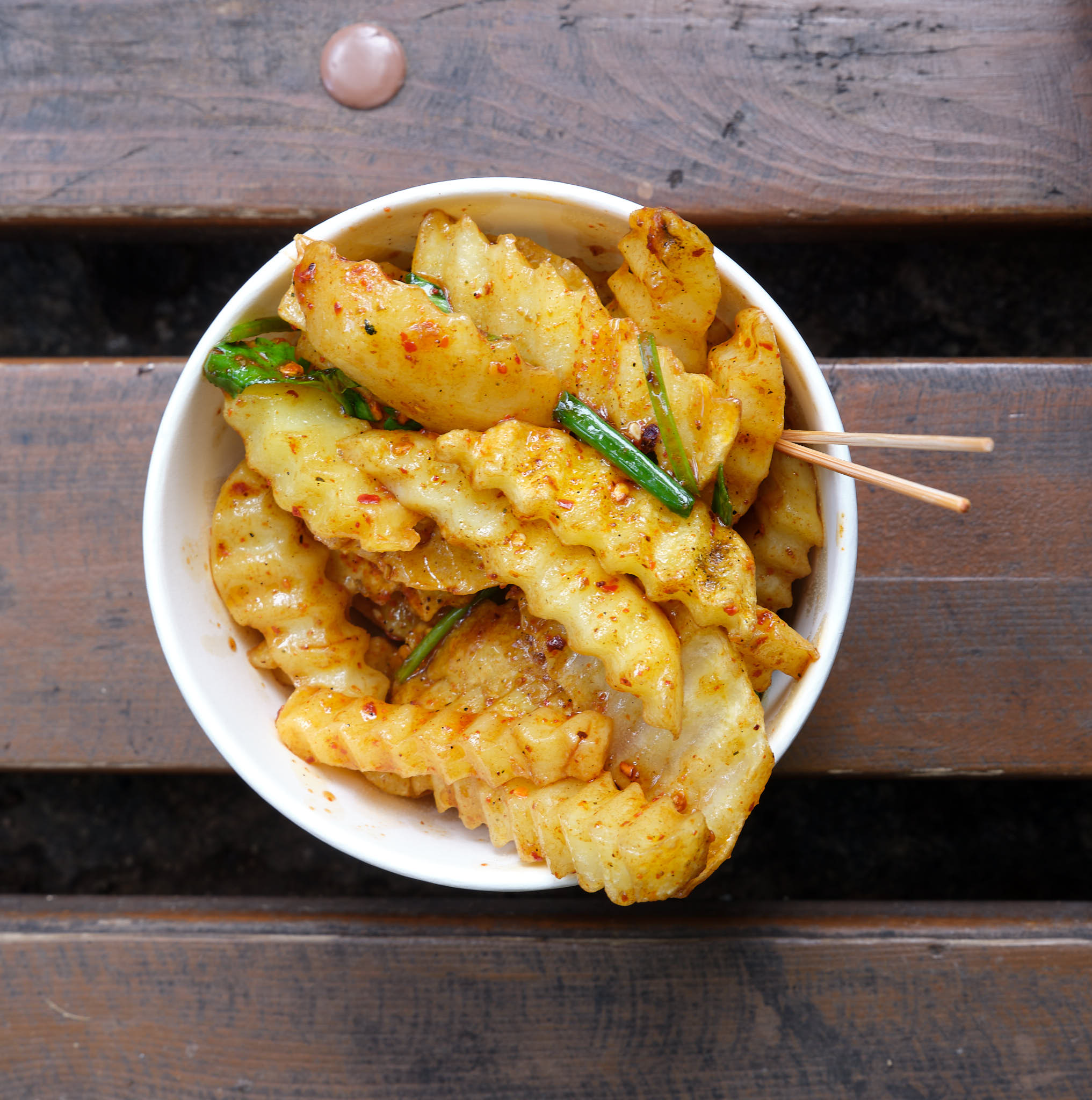 Spicy fries with cumin and coriander on the streets of Shuanglang