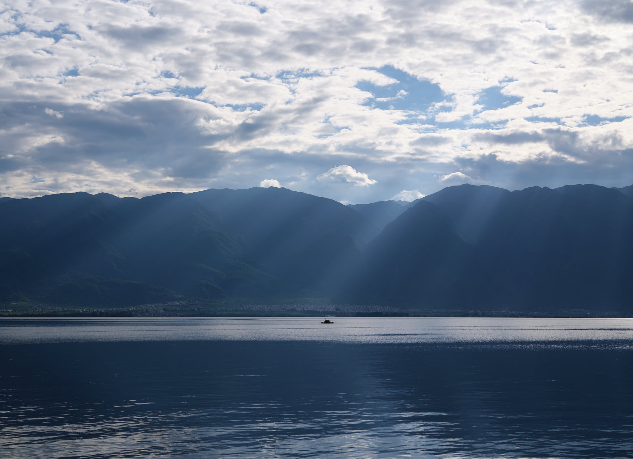 God rays shining down on Erhai Lake