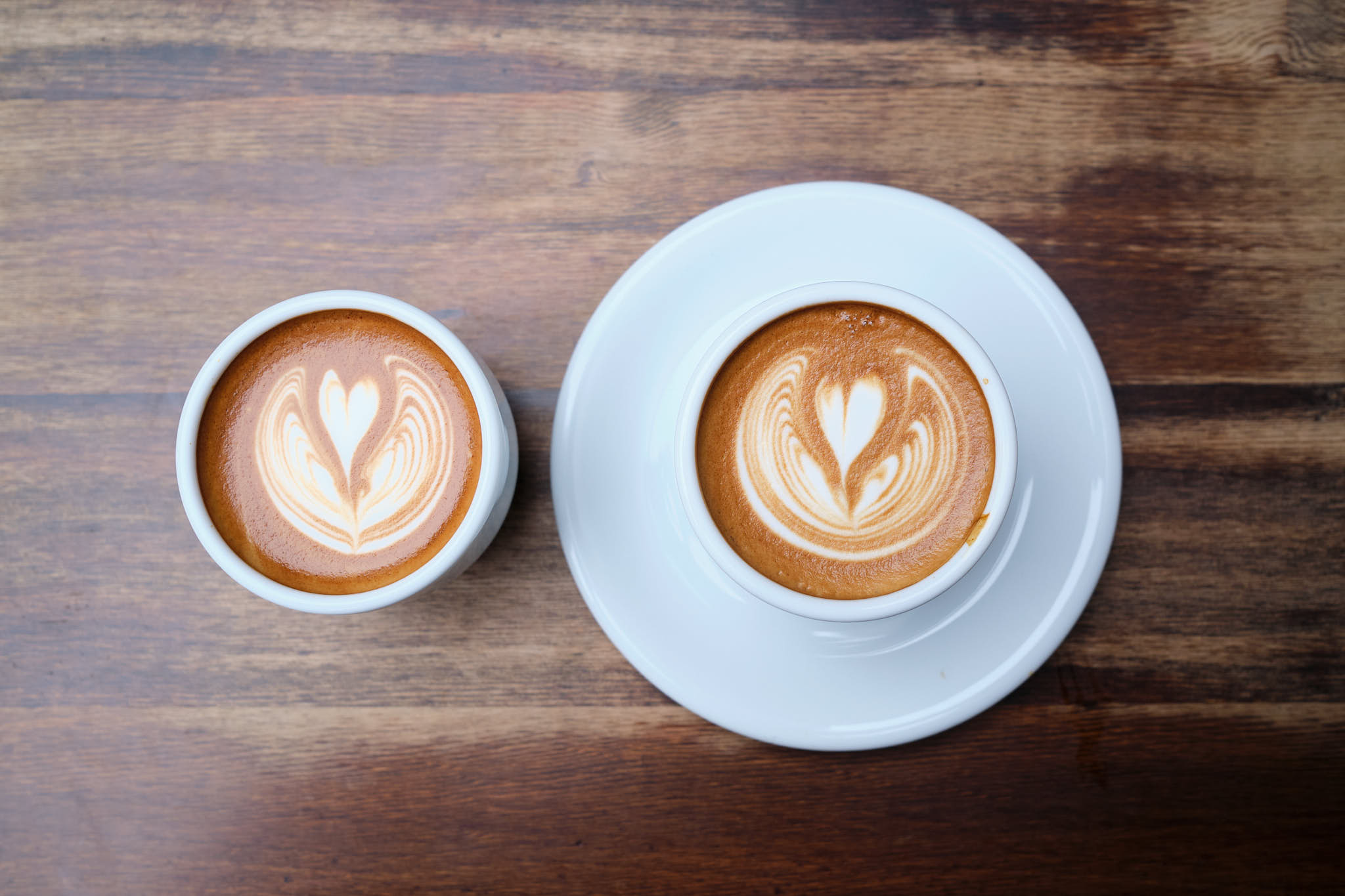 Twin lattes at Arabica% Coffee shop